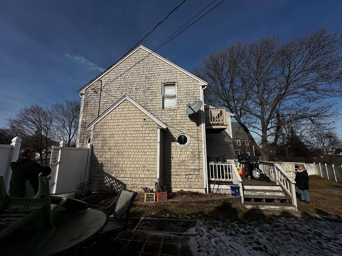 Back right side of the house before the re-side