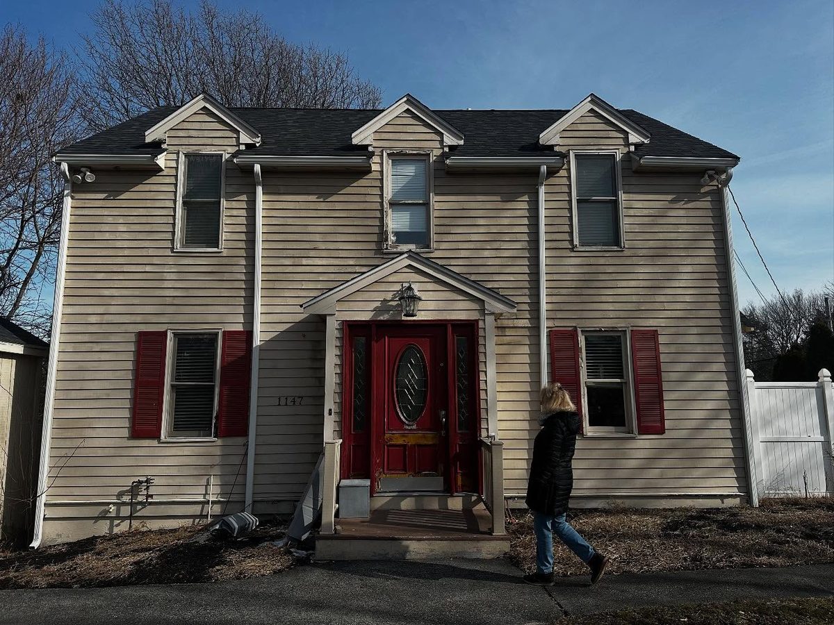 Front of the house before its exterior re-side